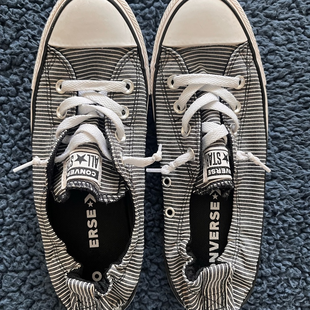 Women’s size 9, Converse all stars. Navy & white striped.